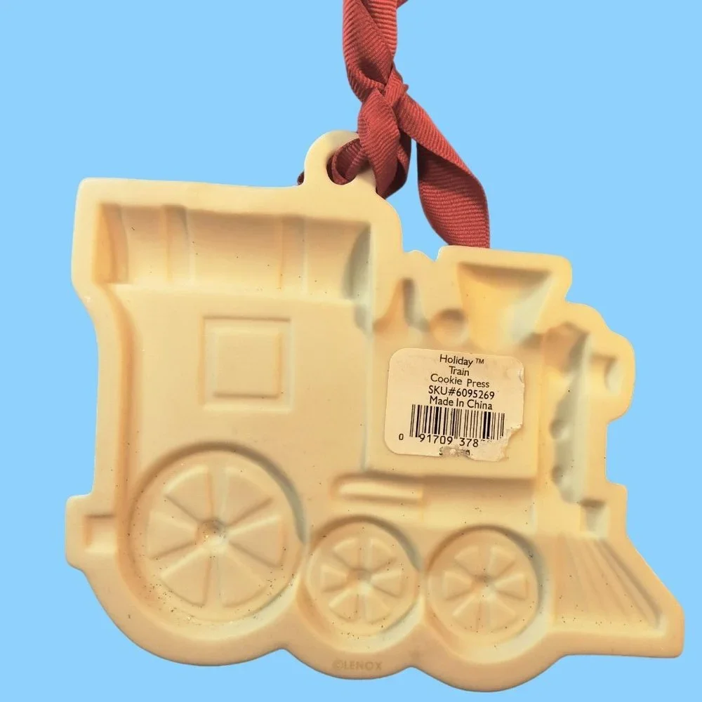 Holiday Train Cookie Press Santa Clause White Ceramic Christmas Ornament